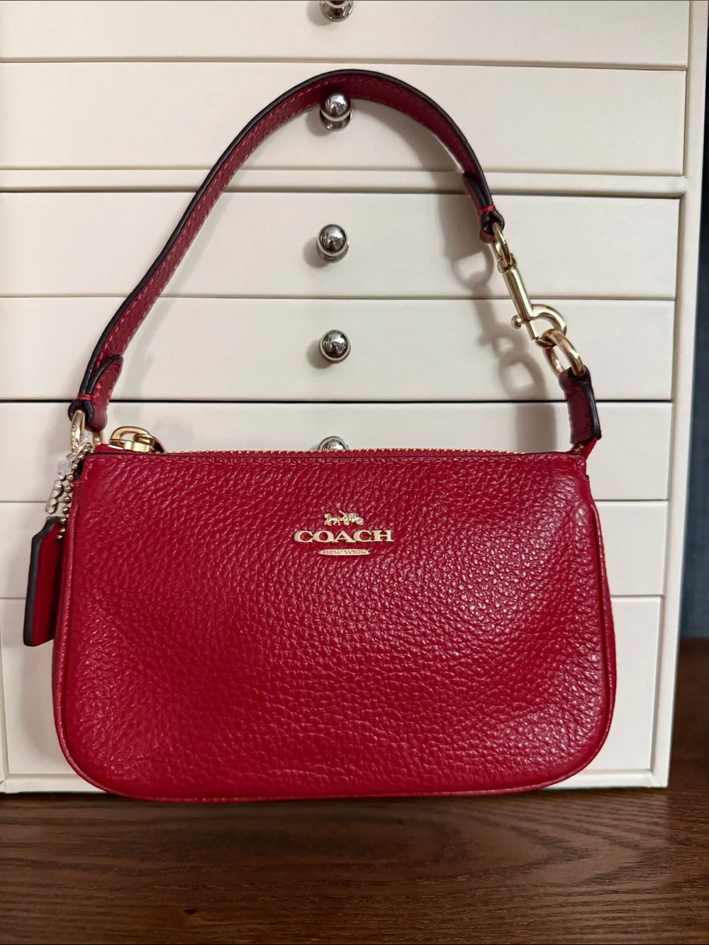 Coach compact tone bid